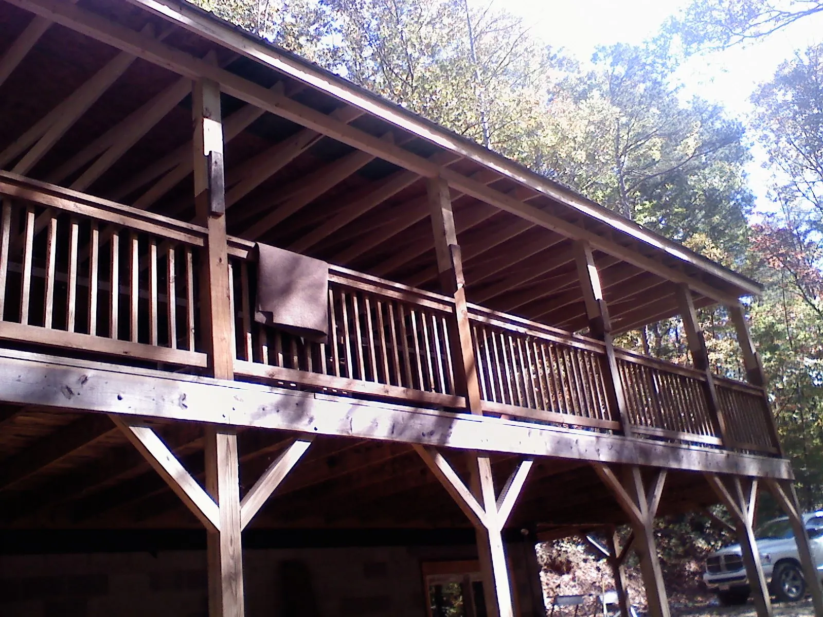 Timber framing under a new elevated porch and deck — Roof Leak Repair in Arcanum by Roofing Brothers